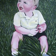 Cute little boy in the grass
